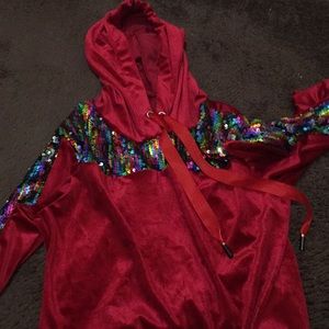 Is a red hoodie with rainbow sequence